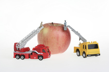 Teamwork concept dolls figure isolated on whiteの写真素材