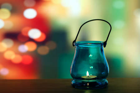 Glass lantern over light shadow backgroundの写真素材