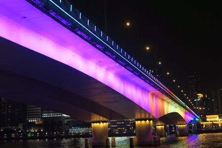 Bridge with neon lights in the nightの写真素材