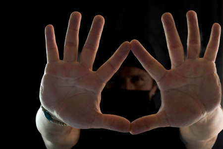 Man's hands in the foreground