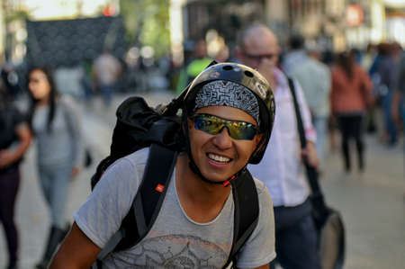 Portrait of Man with helmet, sports glasses and backpack