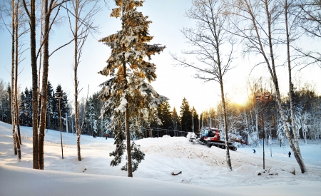tractor aligns ski hillの写真素材