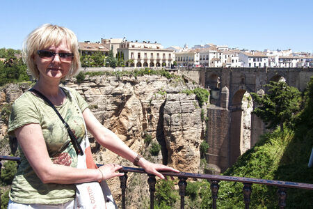 tourist on a background rocks in Ronda, Spainの写真素材