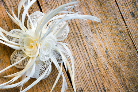 decoration on the head of a flower on wooden backgroundの写真素材