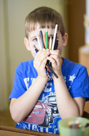 Saint-Petersburg, Russia - April 21, 2016. Russian. Activities in the kindergarten. Children play and learn. Issue year before going to school.のeditorial素材