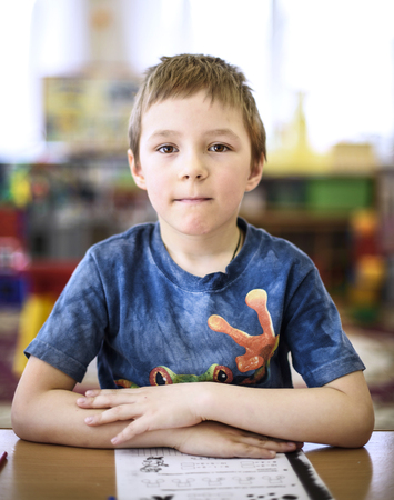 Saint-Petersburg, Russia - April 21, 2016. Russian. Activities in the kindergarten. Children play and learn. Issue year before going to school.のeditorial素材