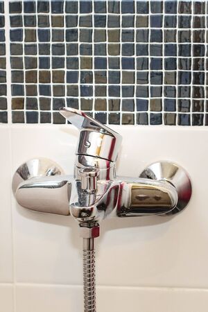 closeup of faucet and faucetの写真素材
