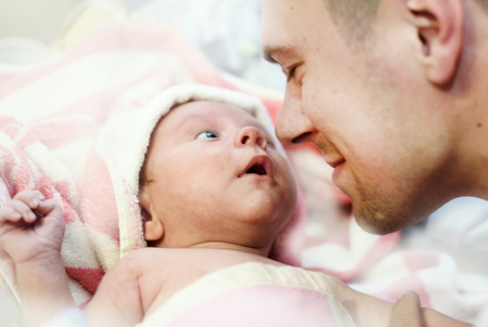 newborn baby boy and dadの写真素材