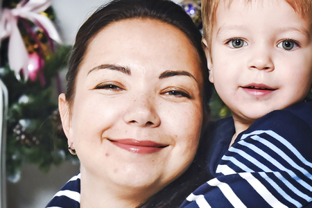 happy mother and son huggingの写真素材