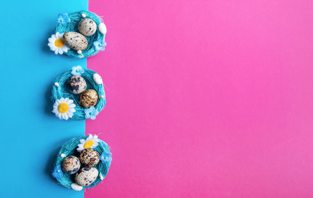 Multi-colored pink and blue background with quail eggs in a basket. Easter card. Space for text