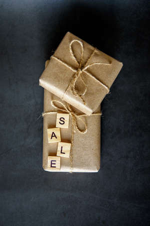 Shopping basket with gift box in waxed paper. The Concept Of Online Shopping. Christmas sales or...