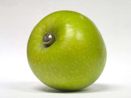 an apple and a skrewの写真素材