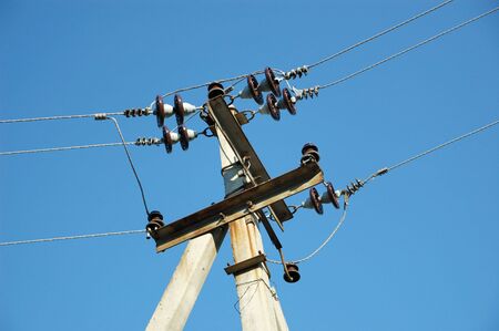 Electric wires on a ferro-concrete column.