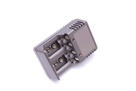 Accu battery charger on a white backgroundの写真素材