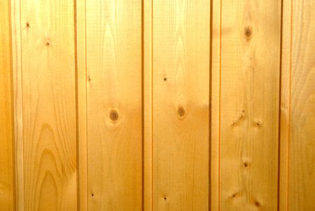 Fragment of a wall revetted with wooden facing boardsの写真素材