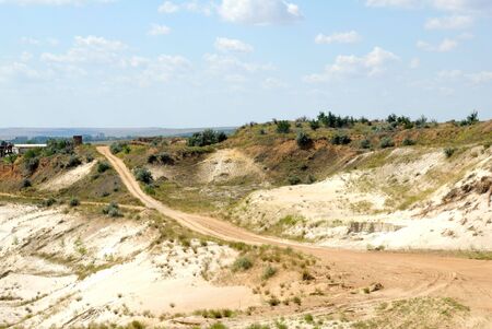 Industrial working out of white forming sand in an open-cast mineの写真素材