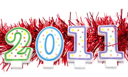 Candles arranged to show the year 2011 on a white background
