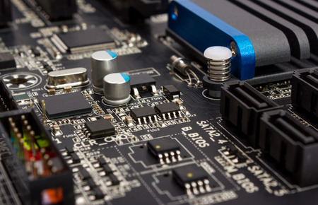 Electronics components on modern PC computer mainboardの写真素材
