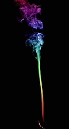 Abstract multicolored smoke on a dark backgroundの写真素材