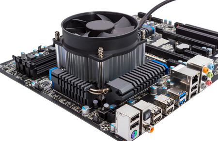 Computer motherboard isolated on white background with CPU cooler