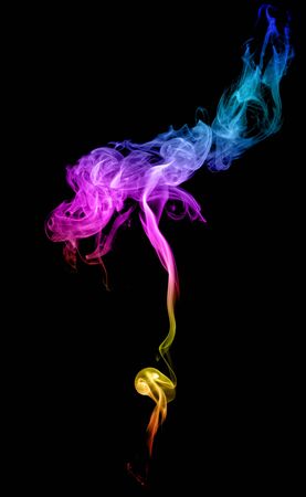 Abstract multicolored smoke on a dark backgroundの写真素材