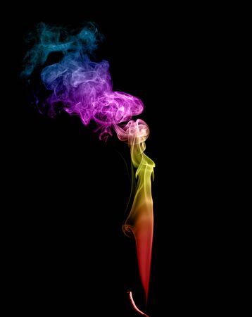 Abstract multicolored smoke on a dark backgroundの写真素材