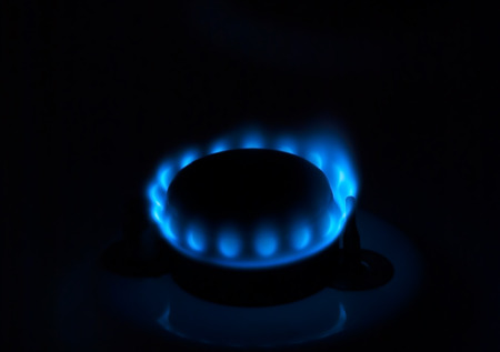 Natural gas burning a blue flames on black backgroundの写真素材