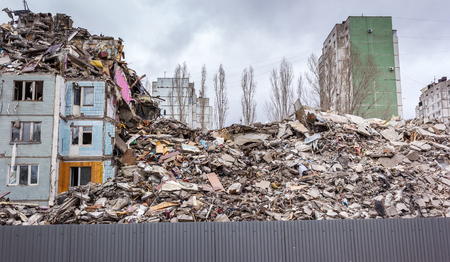 Demolition of buildings in urban environments. House in ruins.