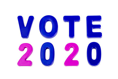 Text VOTE 2020 written in plastic letters on a white background. Concept for the electoral campaign.