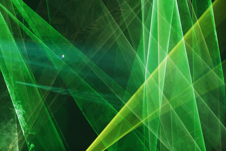 Abstract Colourful green laser show light in nightの写真素材