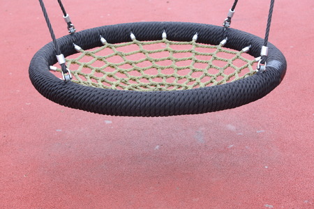 Net Swing bench on a kids playgroundの写真素材