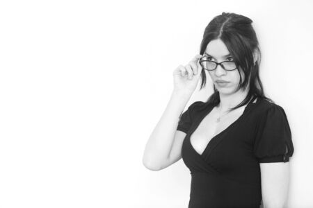 beautiful woman with dark dress in studioの写真素材