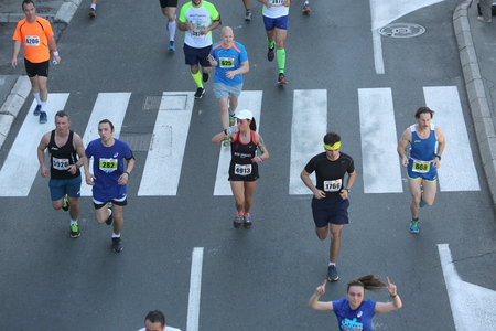 SERBIA, BELGRADE - APRIL 16, 2016: Runners in 29th Belgrade Marathon. Participants of Traditional marathon in Belgrade with more than 4500 runners on streets.のeditorial素材