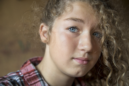 Portrait of Young redhead girl wit blue eye and long hairの写真素材