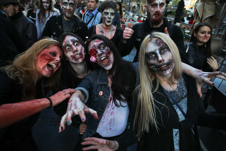 Belgrade, Serbia - October 30, 2017: People makeup and dressed as a zombie during zombie walk in Belgrade, The zombie walk is part of the events of a upcoming Serbian SF movie festivalのeditorial素材