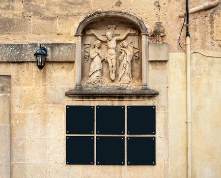 Sculptural relief on ancient stone facade. Commercialの写真素材