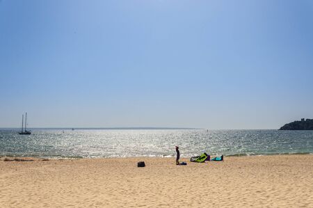 General view of the beach of Palma Nova (Spain) on a sunny day. Preparing materials for windsurfingの写真素材