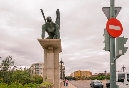 Sculpture of a bronze Gargoyle on one of the bridges in the Turia river park. Valenciaのeditorial素材