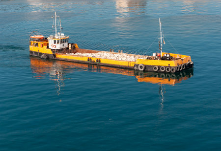 Palma de Mallorca, Balearic Islands/Spain; 01/14/2015: yellow boat in the port of Palma de Mallorca,...