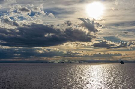 Sunset on the coast of Valencia from the Mediterranean Sea. Landscape from the high seasの写真素材