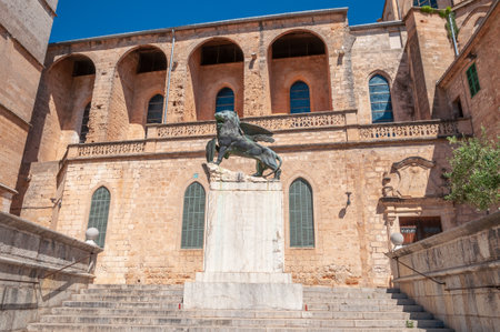 Sineu, Balearic Islands/Spain; may/20/2020: bronze statue of a lion, on the stone staircase leading to the church of Sineuのeditorial素材