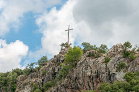 Iron cross from the mountain of the Christian Monastery of Lluc, island of Mallorca, Spainの写真素材