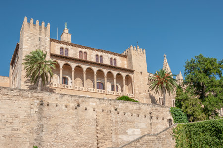 Walls and Almudaina Palace on a sunny day. In the lower areaのeditorial素材