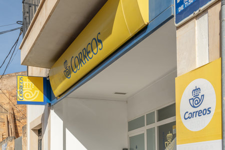 Campos, Spain; January 23 2021: Entrance to the Spanish postal service office (Correos) in the...