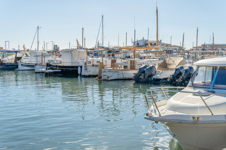 Colonia de Sant Jordi, Spain; February 13 2021: traditional Mallorcan boats on a sunny morning in the Mallorcan town of Colonia de Sant Jordiのeditorial素材
