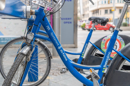 Palma de Mallorca, Spain; March 04 2021: Close-up of a parked blue bicycle, Bicipalma. Public bicycle rental system in the city of Palma de Mallorca. "Palma City Council" written in Catalan languageのeditorial素材