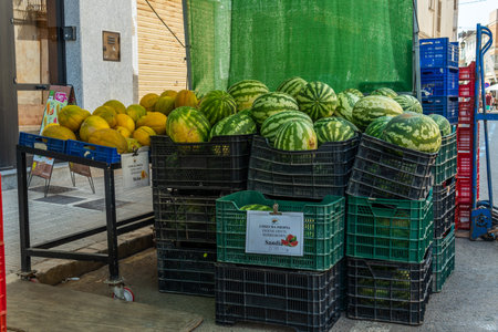 Campos, Spain; August 14 2021: Close-up of watermelons displayed outside a Spanish fruit store. Food of the Mediterranean dietのeditorial素材