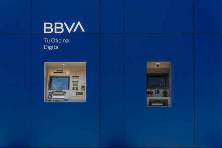 Palma de Mallorca, Spain; April 23 2021: Close-up of an ATM of a BBVA Bank on the street by daylight