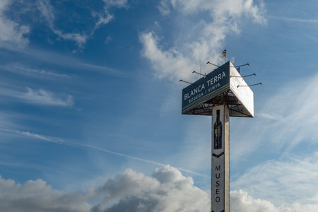 Montuiri, Spain; September 18 2021: Monopost with billboard of the winery Blanca Terra in the Majorcan town of Montuiri, at dawn. Advertising text written in Catalan languageのeditorial素材