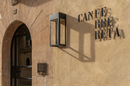 Santanyi, Spain; October 23 2021: Main facade of the small urban luxury hotel, Can Ferrereta and its restaurant Ocre, in the Mallorcan town of Santanyi, at sunsetのeditorial素材